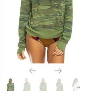 New - bought and is a bit small for me. Worn a couple of times.